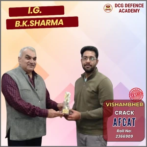 AFCAT achiever receiving award from DCG Defence Academy faculty