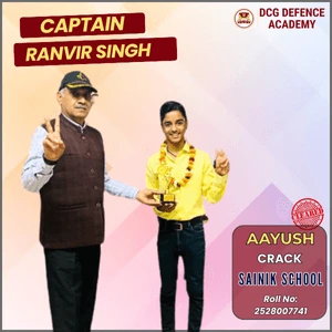 Captain Ranvir Singh congratulating Aayush for Sainik School success