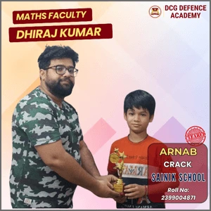 Maths Faculty Dhiraj Kumar presenting award to Arnab for Sainik School success